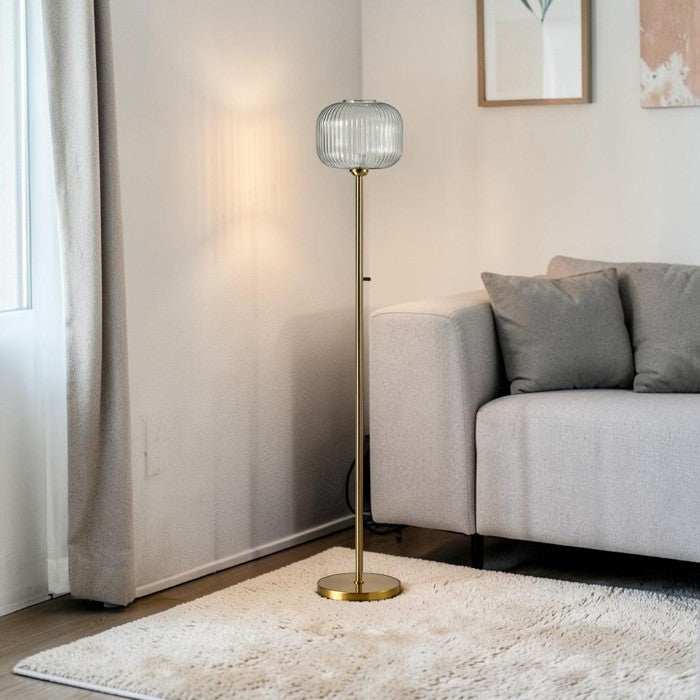 Modern Floor Lamp with Glass Globe Shade and Brass Finish